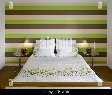 Striped lime green and brown wallpaper in private House, Worsley, Salford, Greater Manchester, England, UK. Stock Photo