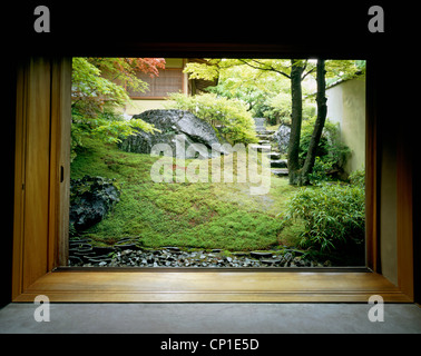 View through doorway to oriental style garden Stock Photo