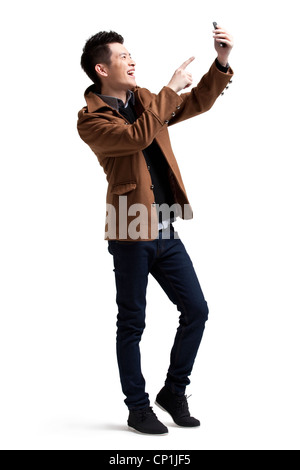 Stylish young man with moblie phone Stock Photo
