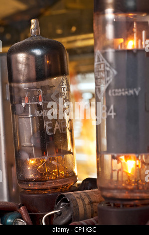 Radio tubes in an old radio receiver. Stock Photo