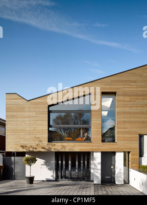 Timber cladding on building exterior of private house in Worsley, Salford, Greater Manchester, England, UK. Stock Photo