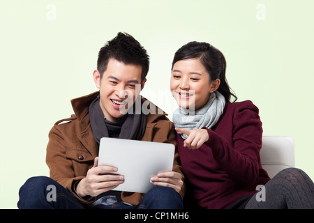 Young couple using digital tablet Stock Photo