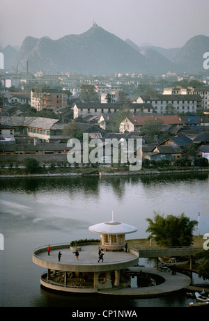 Early morning scene with people exercising in a park in Guilin, China, December 1982 Stock Photo