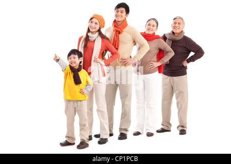 Family members looking afar and pointing the front Stock Photo
