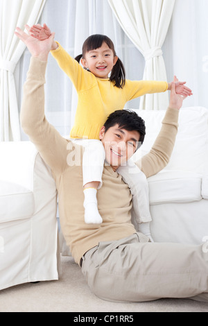 Father playing with his daughter Stock Photo