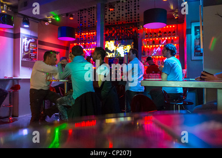 Paris, France, Medium Crowd People, Men Sharing Drinks Inside French Gay Bar, Pub, 'The Eagle', inside bar france, drinks alcohol busy Stock Photo