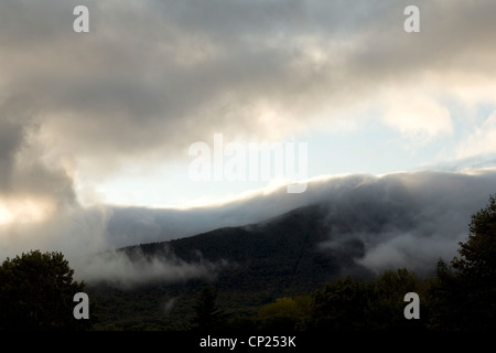 Low clouds hang over Mount Greylock as seen from Adams, Massachusetts. Stock Photo