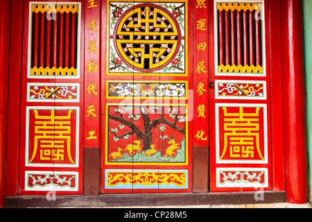 Doorway at the entrance to Chinese family Temple, Hoi An, Quang Nam province, Vietnam Stock Photo