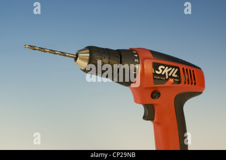 CLOSE-UP OF CORDLESS DRILL WITH BIT / STUDIO Stock Photo