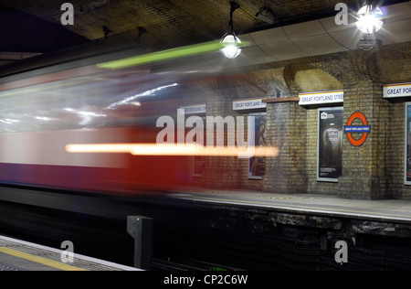 Late night London Underground train leaving Great Portland Street tube train Stock Photo