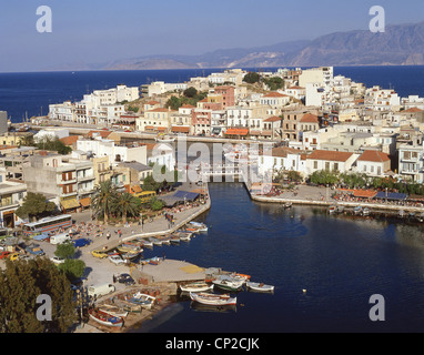 View of town and harbour, Agios Nikolaos, Lasithi Region, Crete (Kriti), Greece Stock Photo