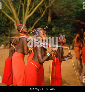 Masai children performing a dance in The Maasai Mara National Reserve, Narok County , Kenya Stock Photo