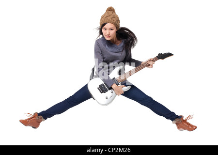 Stylish young woman playing guitar Stock Photo