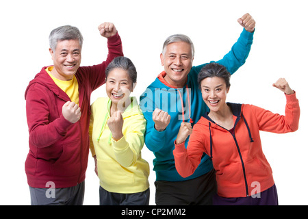Healthy senior people punching the air Stock Photo