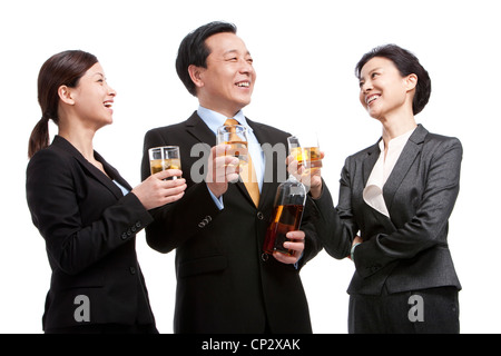 Business team enjoying whiskey Stock Photo