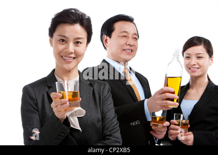 Business team enjoying whiskey Stock Photo