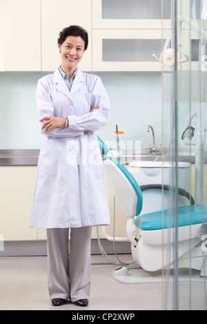 Dentist in dental clinic Stock Photo