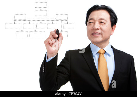 Senior businessman drawing a diagram Stock Photo