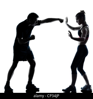 one couple man woman exercising workout aerobic fitness posture full length silhouette on studio isolated on white background Stock Photo