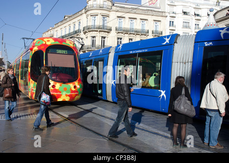 Streetcars - trams - from two different lines crossing in the center of Montpellier, France. Stock Photo