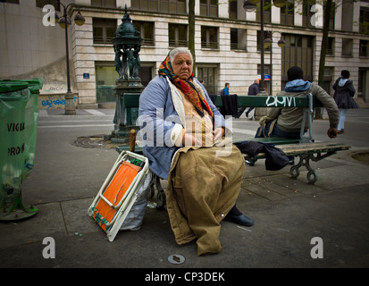 Urban poverty, A Romanian, in place of Budapest in Paris Stock Photo