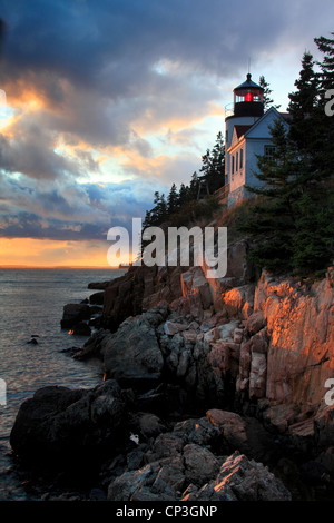 Photo of Bass Harbor Head Lighthouse with an approaching storm, Acadia National Park, Maine, USA Stock Photo