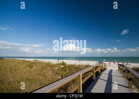 Beach entrance -  People enjoying sunny day at Sanibel Island Florida beach Stock Photo