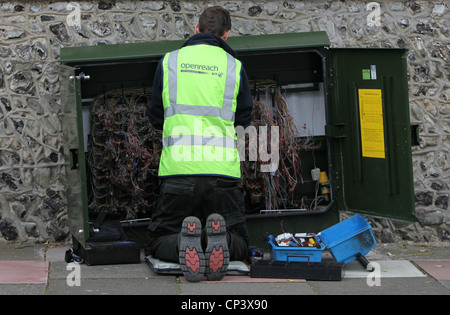 BT Openreach telephone engineer working on residential phone lines. Stock Photo