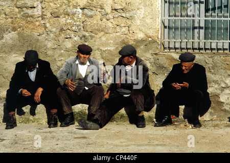 Sardinia - Barbagia Ollolai - Orgosolo (Nu), conversation between men. Stock Photo