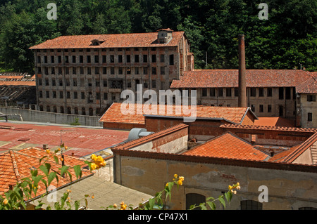 Piedmont Biella. Buildings of former mill Maurizio Sella, industrial archaeological complex (XVII-XIX century) on banks of Stock Photo