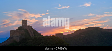 A 2 picture stitch panoramic of the Jinshanling section of the Great Wall of China at sunset. This is an HDR image. Stock Photo