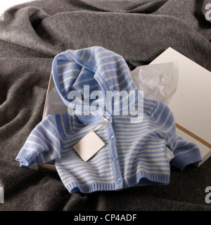 A still life shot of cute baby clothes Stock Photo