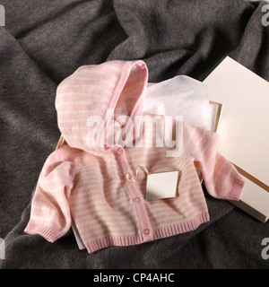 A still life shot of cute baby clothes Stock Photo