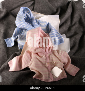 A still life shot of cute baby clothes Stock Photo