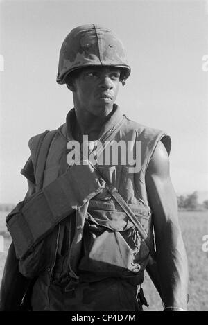 Vietnam War. African American Marine on patrol 8 miles south of the ...