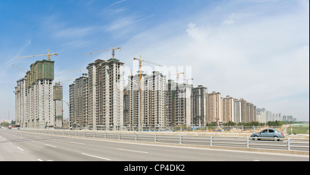 A 2 picture stitch panoramic of new construction apartment blocks next to the Nanhuan Bridge in Datong. Stock Photo