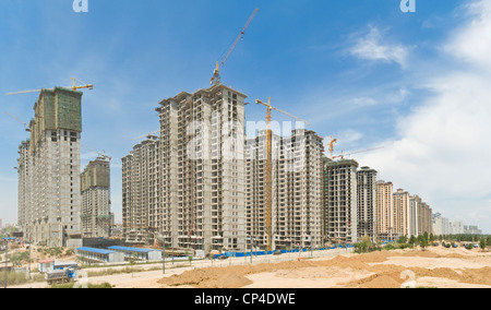 A 2 picture stitch panoramic of new construction apartment blocks next to the Nanhuan Bridge in Datong. Stock Photo