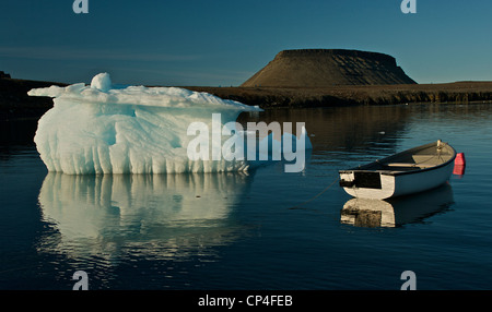 Greenland - Qaasuitsup Kommunia - Disko Island - Dundas. Iceberg with boat. Stock Photo