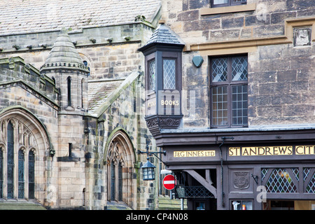 J and G Innes Bookshop and Holy Trinity Church St Andrews Fife Scotland Stock Photo