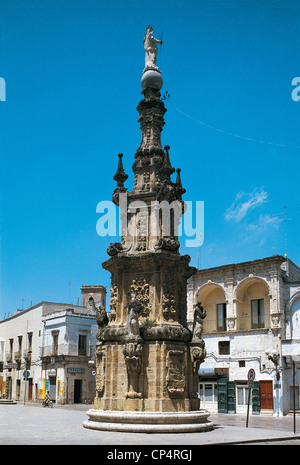 Puglia Nardo '(LE). Spire of Immaculate Conception, baroque column dedicated to Virgin in Piazza Salandra, built in 1769. Stock Photo