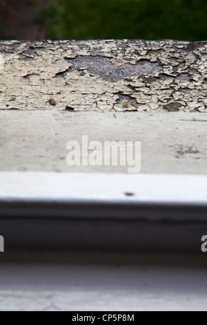 Cracked Paint on Window Sill Stock Photo