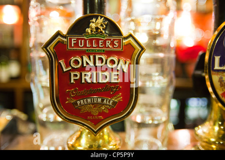 A real ale hand pump on the bar of the Euston Flyer, Kings Cross, London, UK. Stock Photo