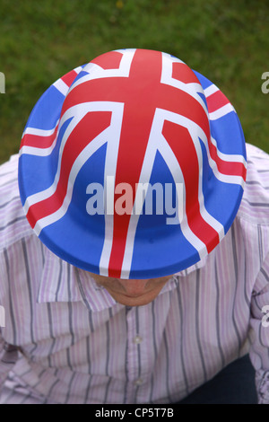 dressing up in a plastic united kingdom flag hat Stock Photo