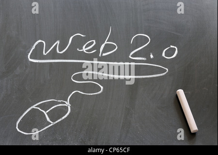 Web 2.0 and mouse drawn on the chalkboard Stock Photo