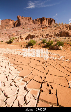 mud cracks in a dried up river bed in the Anti Atlas of Morocco, that is suffering from drought. Stock Photo