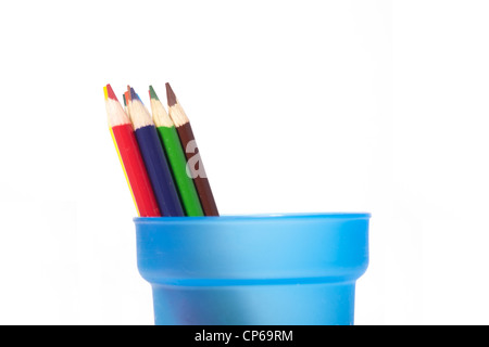 Coloring pencils to side of cup. Stock Photo