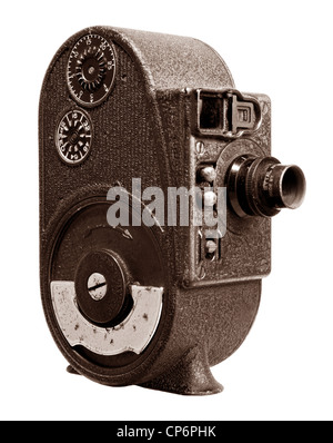 A pre world war 2  vintage film movie camera isolated on white.  It uses no batteries and runs on wind up spring power. Stock Photo
