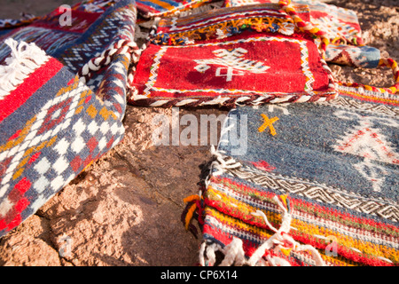 Berber Moroccan woven cloth rugs and bags in the Anti Atlas mountains of Morocco, North Africa. Stock Photo