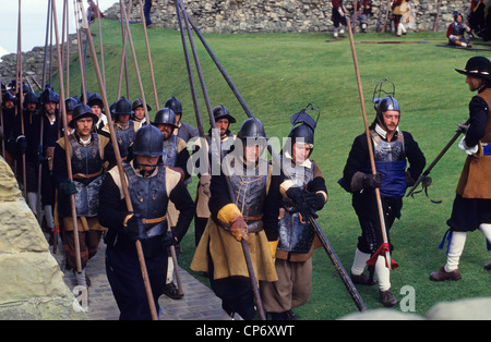 soldiers marching to battle during english civil war re inactment scarborough castle yorkshire uk Stock Photo