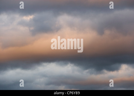 Cloudscape Blue and Pink Orange Cumulus Clouds of  Mid Winter Sunset, Sheffield, UK, Background Stock Photo